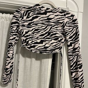 backless zebra print long sleeve top